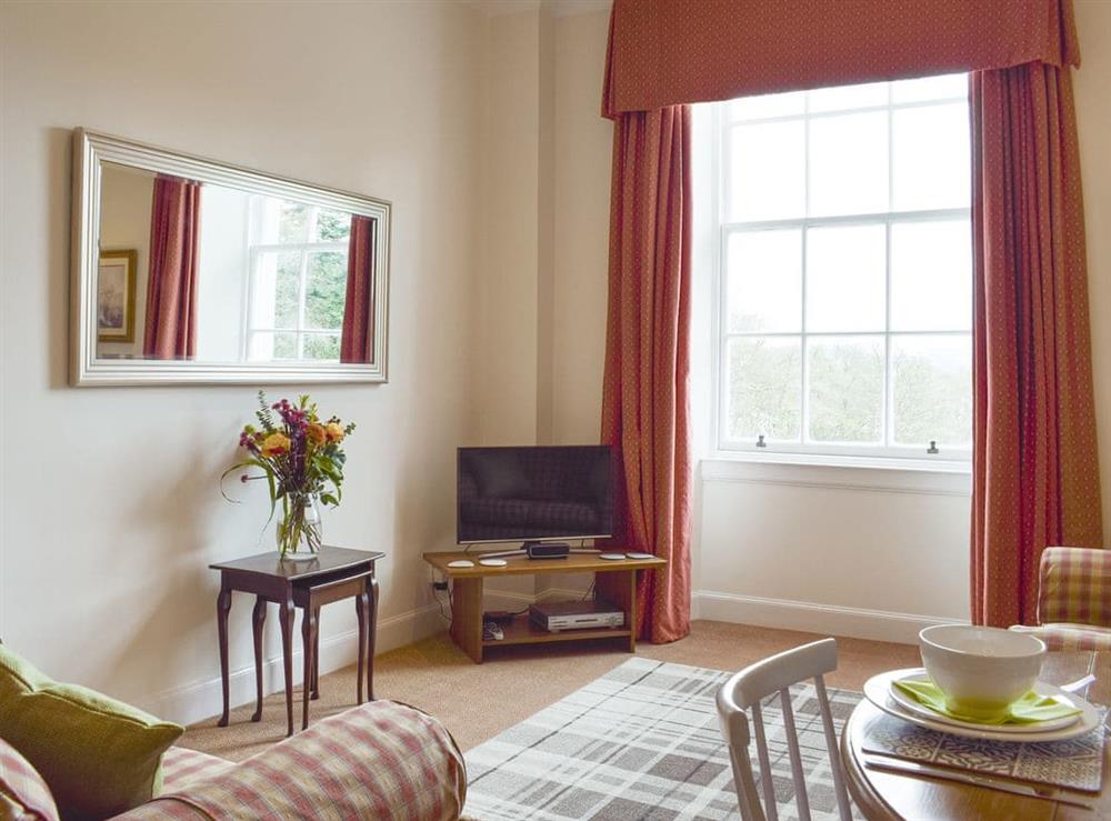 Welcoming living area at The Rob Roy Apartment, 