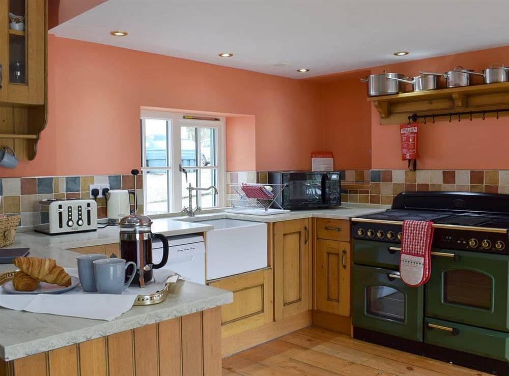 Well equipped kitchen area at Graces Cottage, 