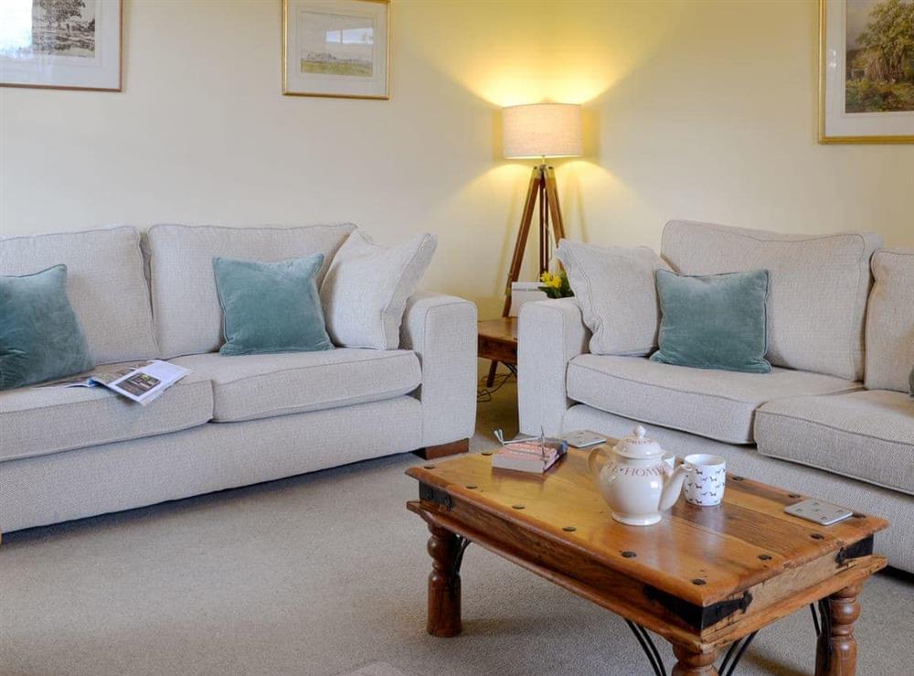 Comfy seating within living room at Islabank Farmhouse in Meigle, Perthshire., Great Britain