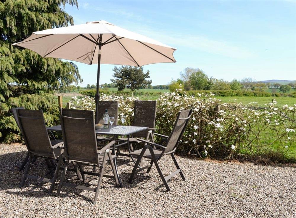 Garden furniture with rural views at Islabank Farmhouse in Meigle, Perthshire., Great Britain