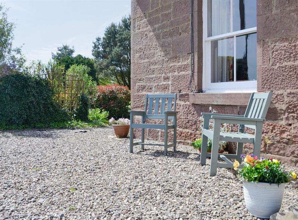 Gravelled patio area with outdoor seating at Islabank Farmhouse in Meigle, Perthshire., Great Britain