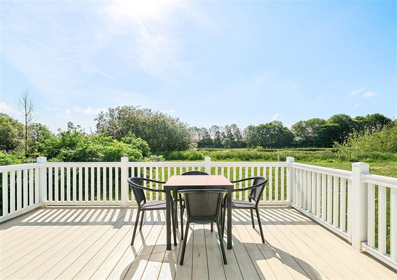 Enjoy a glass of wine on the patio at Island Breeze - Hayling Island, Hayling Island Holiday Park