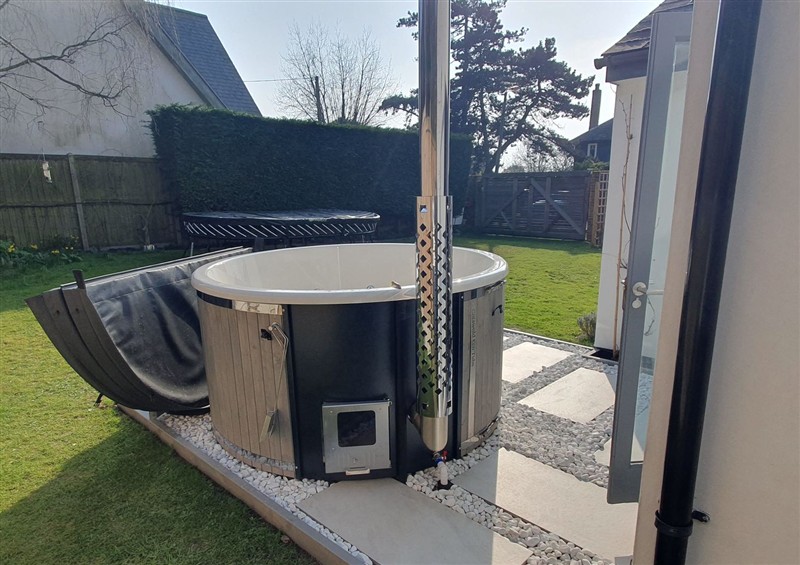 There is a hot tub at Island Retreat, Mersea Island
