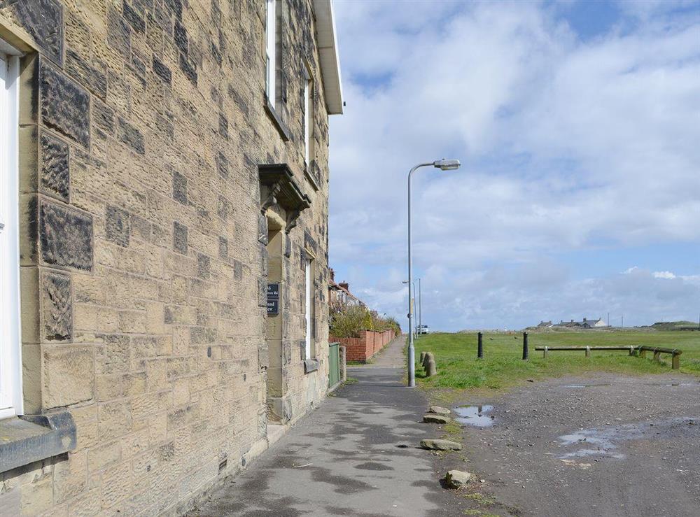 The house is set at the end of a row of houses close to the centre of town at Island View in Amble, Northumberland
