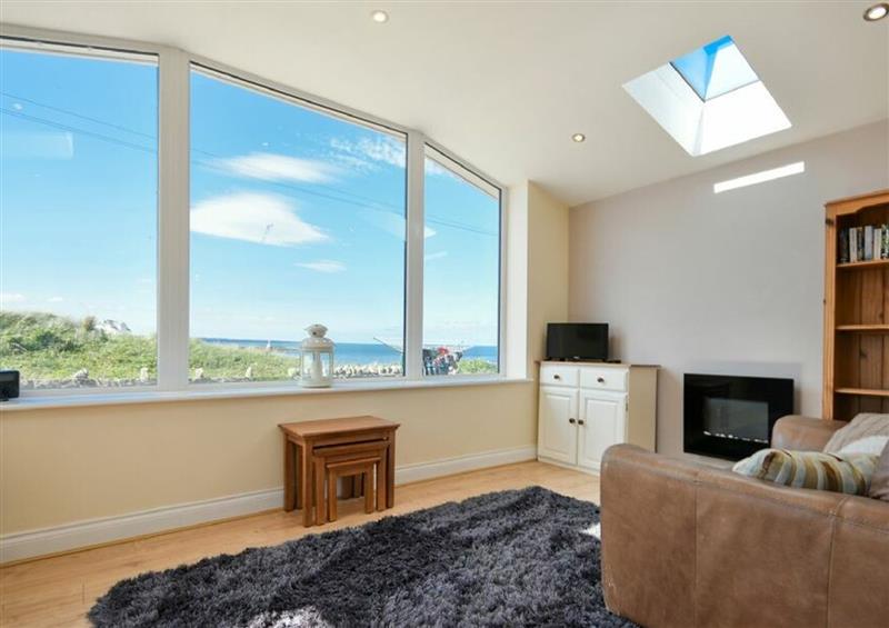 Relax in the living area at Island View, Amble
