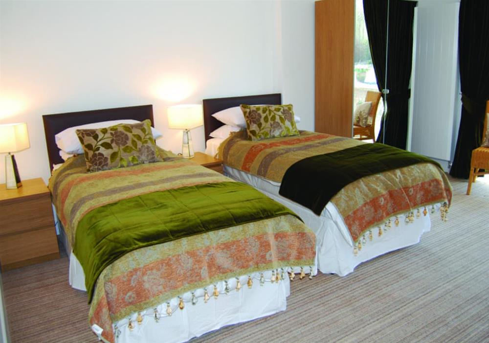 Island View double bedroom with zip and link beds at Island View in Ayr, Ayrshire