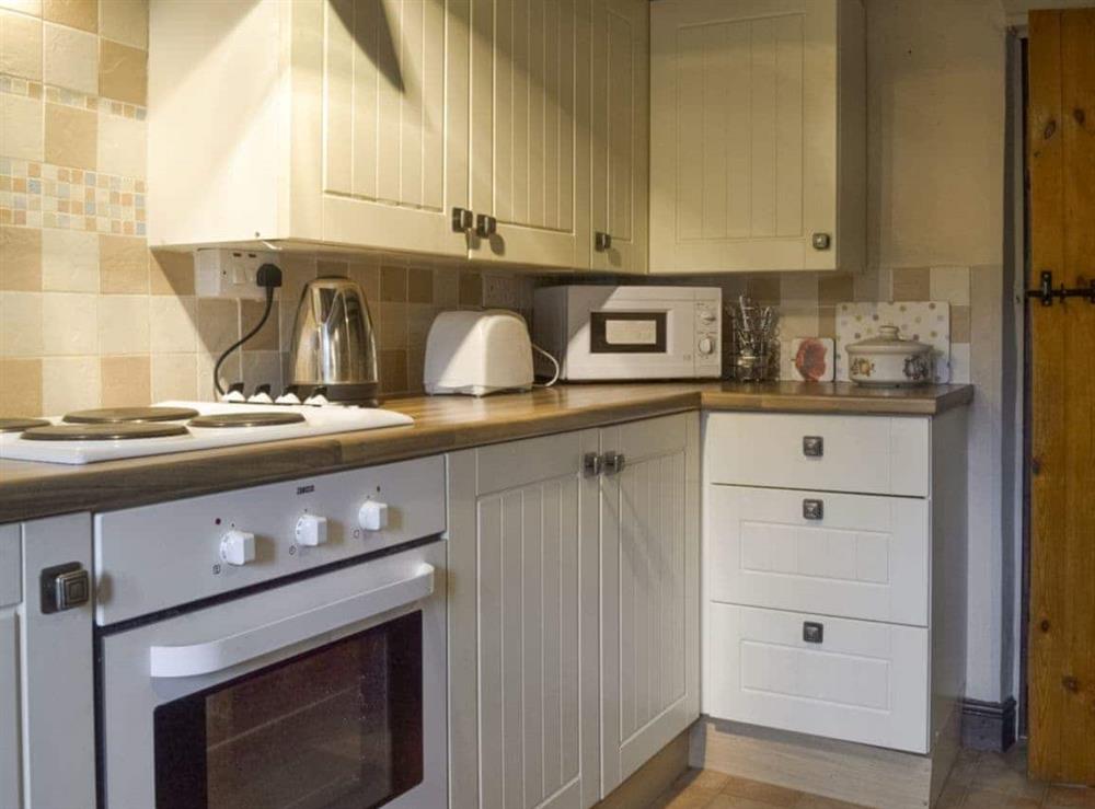 Well-equipped kitchen at Ivy Cottage in Aldwark, near Matlock, Derbyshire