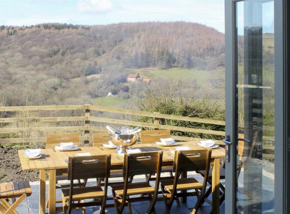 Fabulous patio area with seating for eight and fantastic views at Ivy Cottage in Beck Hole, near Whitby, North Yorkshire