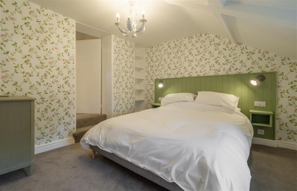 First floor: Master bedroom at Ivy Cottage, Burnham Market near Kings Lynn