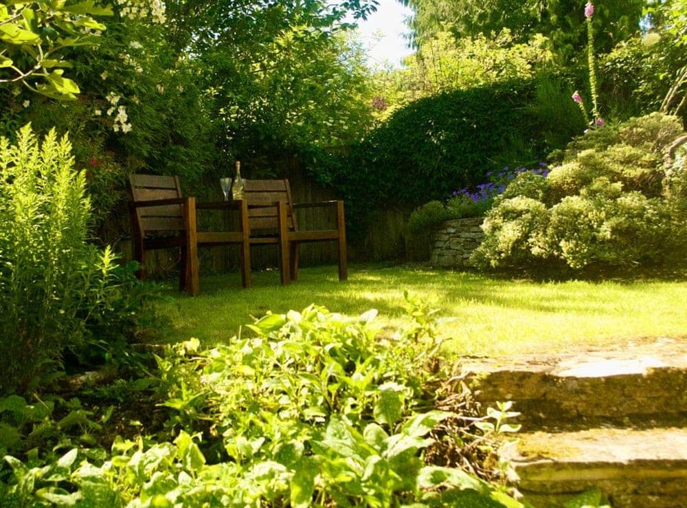 Lovely tiered garden at Ivy Cottage in Chedworth, near Cheltenham, Gloucestershire