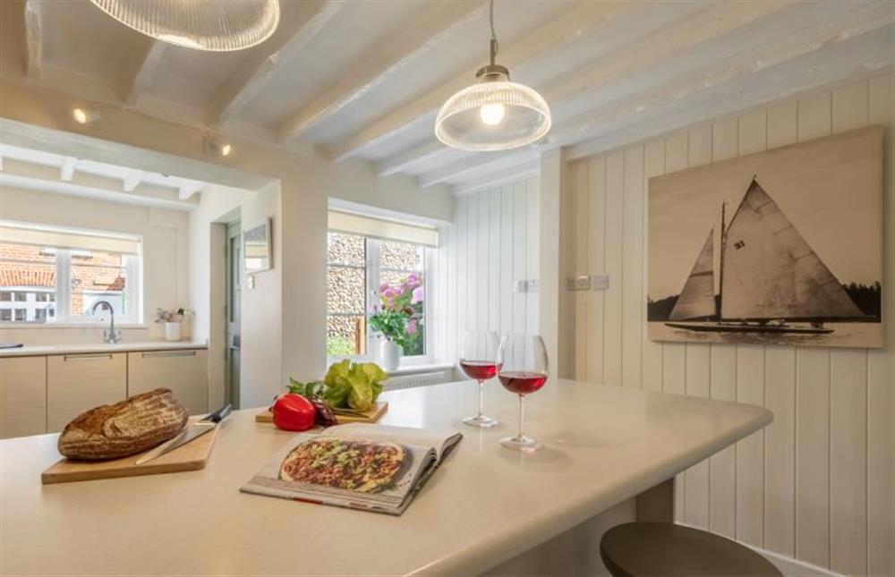 Ground floor: Kitchen and breakfast bar at Ivy Cottage, Docking near Kings Lynn