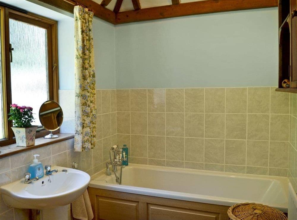 Bathroom with shower attachment at Ivy Cottage in Ewhurst Green, near Bodiam, E. Sussex., East Sussex