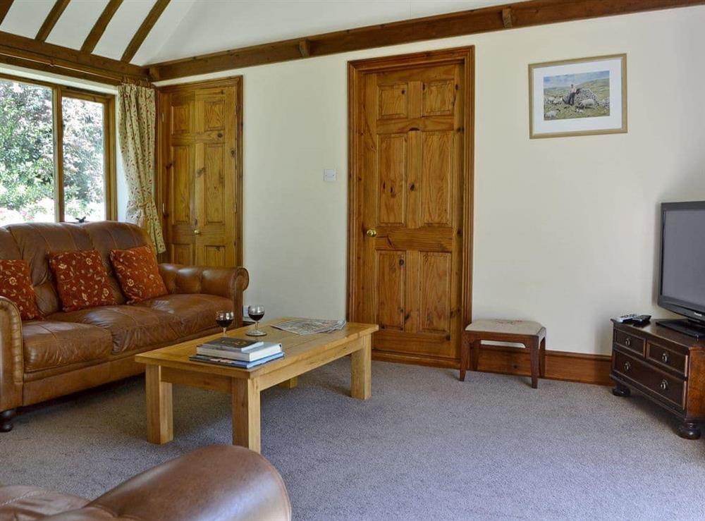 Welcoming living/dining room (photo 2) at Ivy Cottage in Ewhurst Green, near Bodiam, E. Sussex., East Sussex