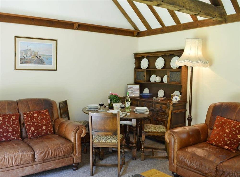 Welcoming living/dining room (photo 3) at Ivy Cottage in Ewhurst Green, near Bodiam, E. Sussex., East Sussex