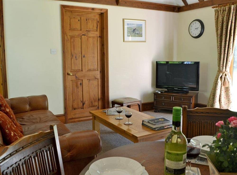 Welcoming living/dining room at Ivy Cottage in Ewhurst Green, near Bodiam, E. Sussex., East Sussex