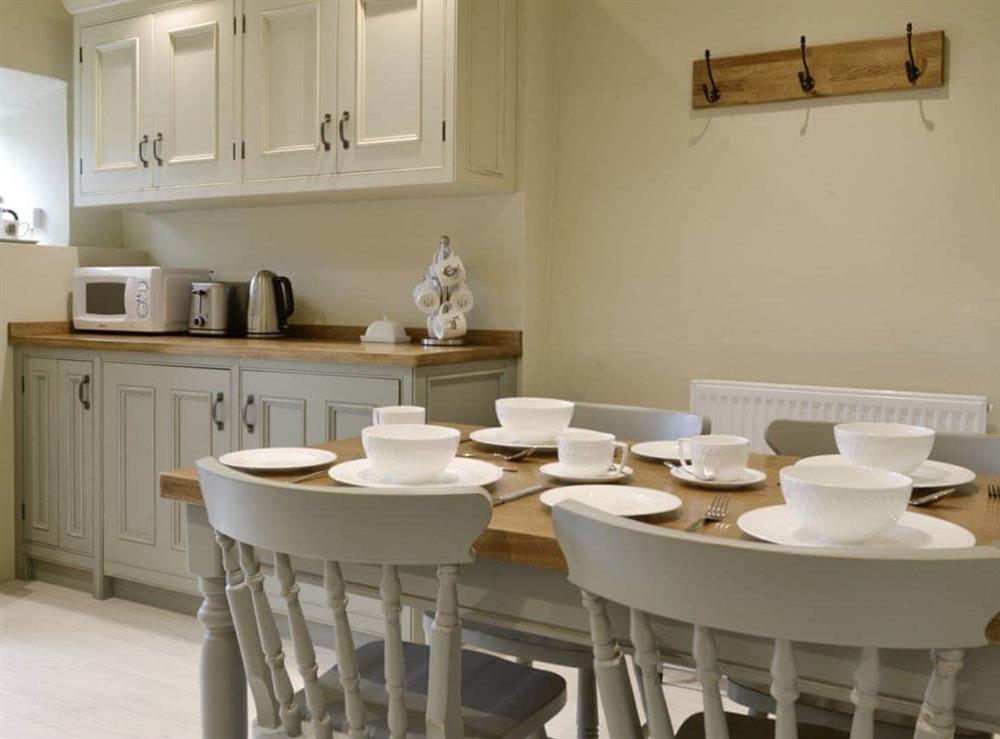 Convenient dining area within kitchen at Ivy Cottage in Grassington, near Skipton, North Yorkshire