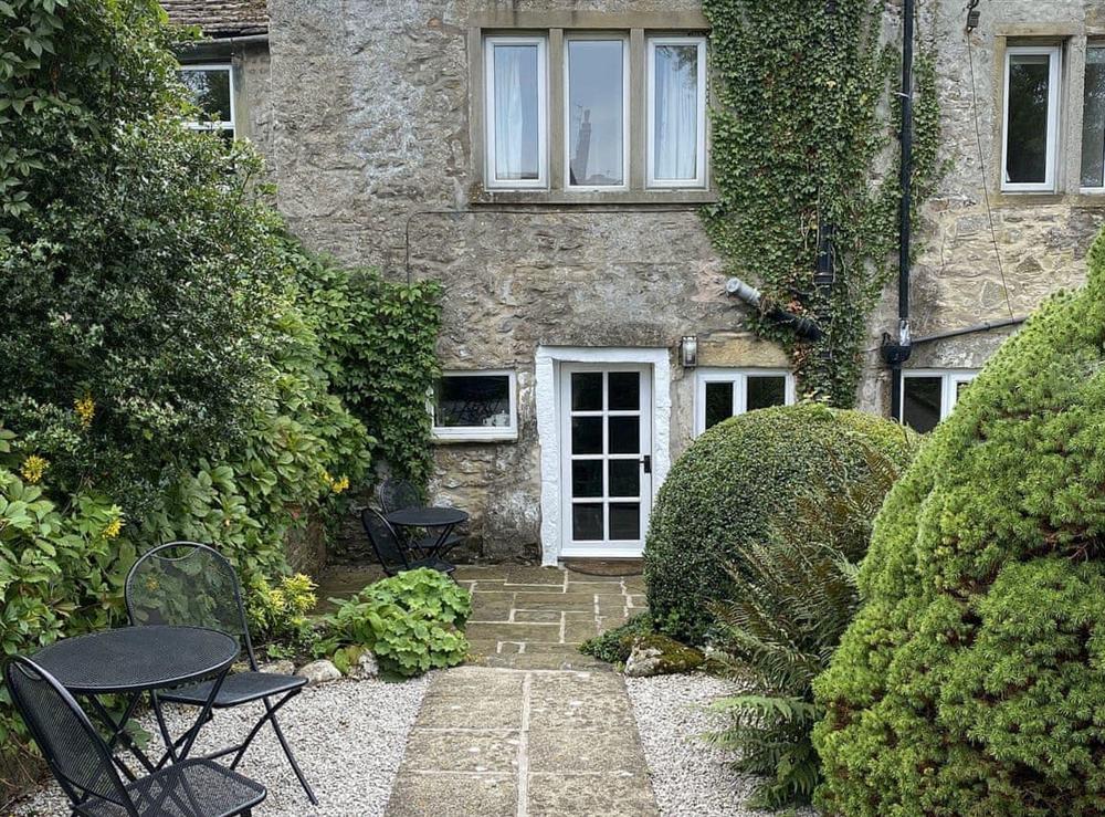 Rear courtyard and garden at Ivy Cottage in Grassington, near Skipton, North Yorkshire