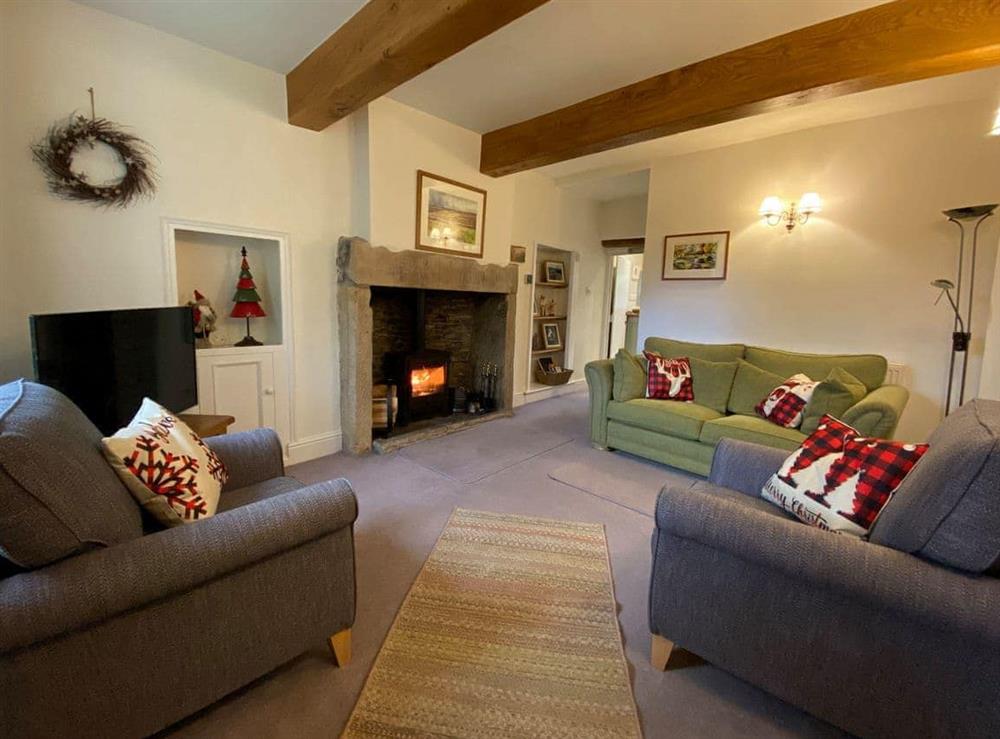 Warm and welcoming living room at Ivy Cottage in Grassington, near Skipton, North Yorkshire