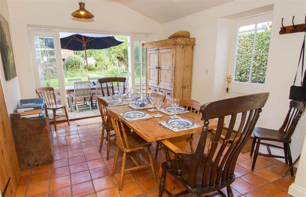 Dining area overlooks the garden at Ivy Cottage (Thornham), Thornham near Hunstanton