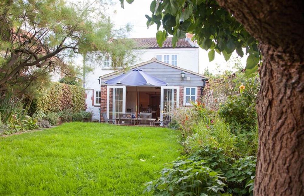 Fully enclosed garden with mature planting at Ivy Cottage (Thornham), Thornham near Hunstanton