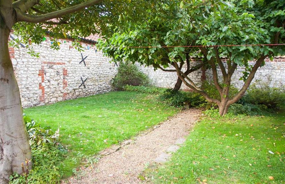 The lovely walled garden has mature fruit trees at Ivy Cottage (Thornham), Thornham near Hunstanton