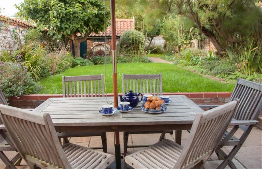The walled garden and patio are great for relaxing in at Ivy Cottage (Thornham), Thornham near Hunstanton