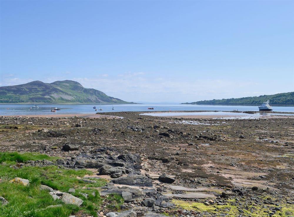 The beach is only 20 yards from the property (photo 2) at Ivybank Cottage in Lamlash, Isle of Arran, Isle Of Arran