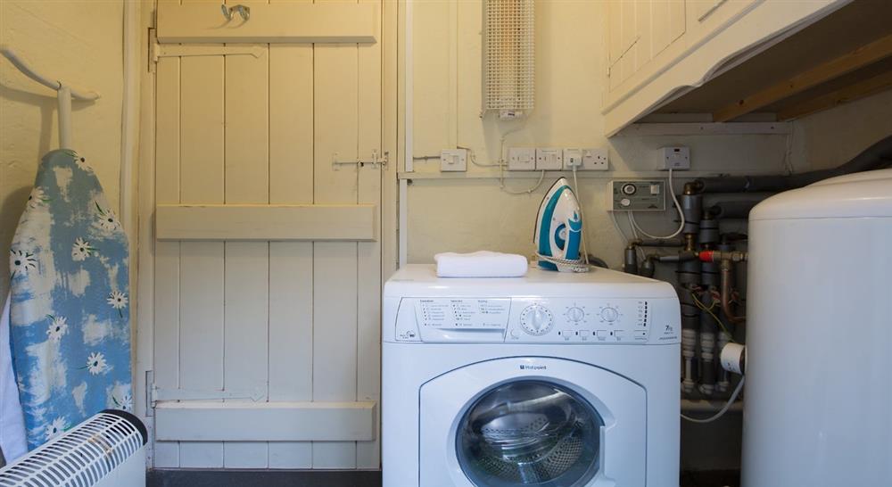 The utility room at Ivys Cottage in Minehead, Somerset