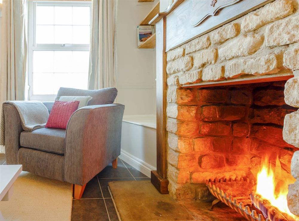 Cosy open fire at Jacks Cottage in Easton On The Hill, near Stamford, Northamptonshire