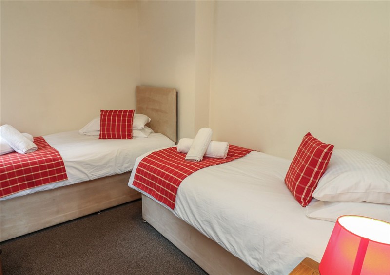 This is a bedroom at James Ville Marina Lodge 13, Brigg
