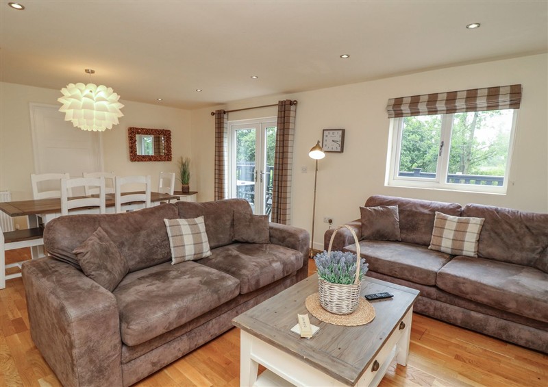 Relax in the living area at James Ville Marina Lodge 14, Brigg