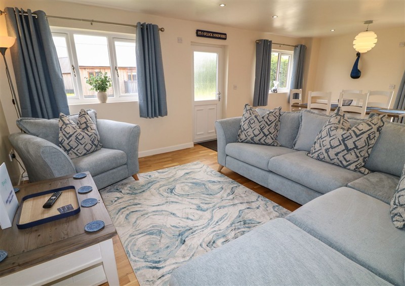 Relax in the living area at James Ville Marina Lodge 21, Brigg