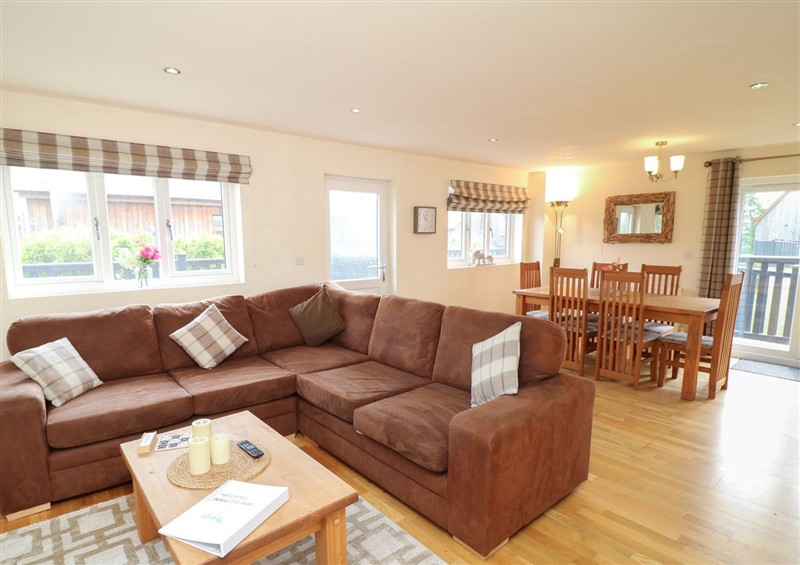 Relax in the living area at James Ville Marina Lodge 7, Brigg