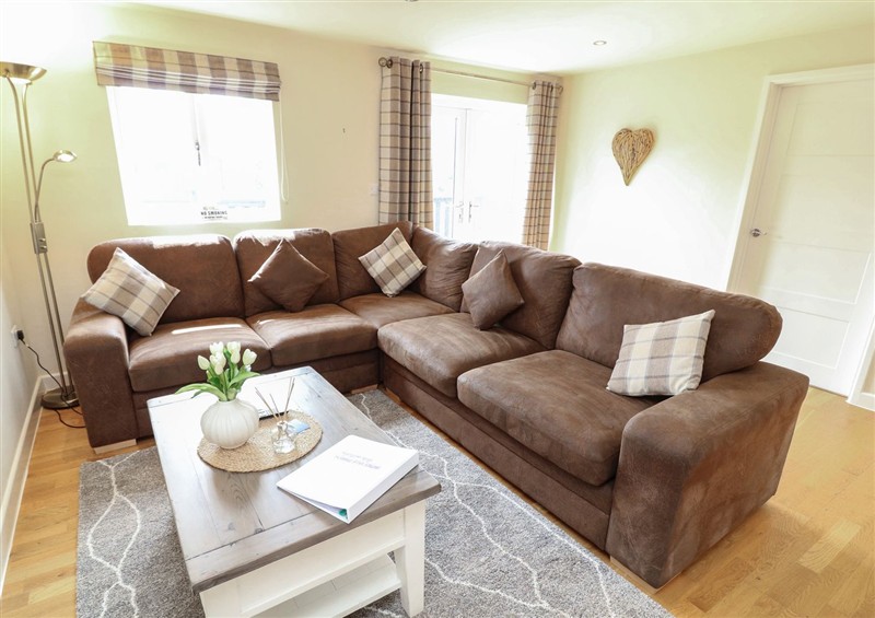 The living room at James Ville Marina Lodge 8, Brigg