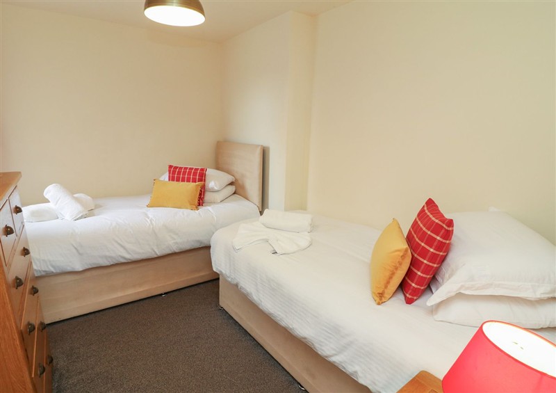 This is a bedroom at James Ville Marina Lodge 9, Brigg
