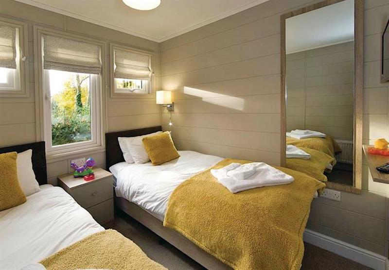 Twin bedroom at Limestone Lodge at Jamies Cragg Holiday Park in Welburn, Vale of York