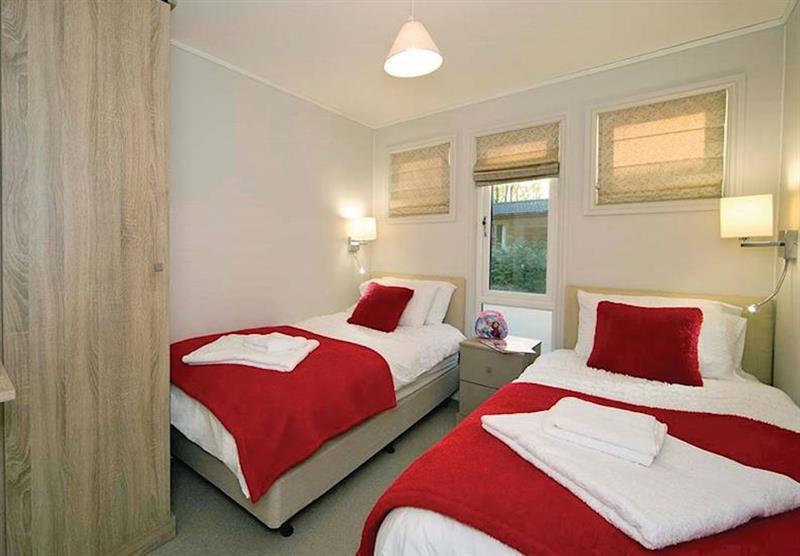 Twin bedroom in the Sandstone Lodge at Jamies Cragg Holiday Park in Welburn, Vale of York