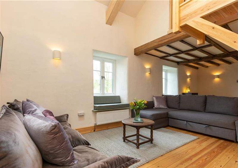 Relax in the living area at Janes Cottage, Hawkshead