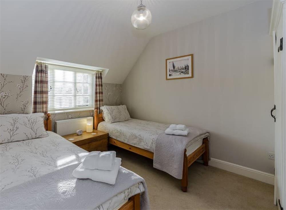 Twin bedroom at Jasmine Cottage in Bourton-on-the-Water, Gloucestershire