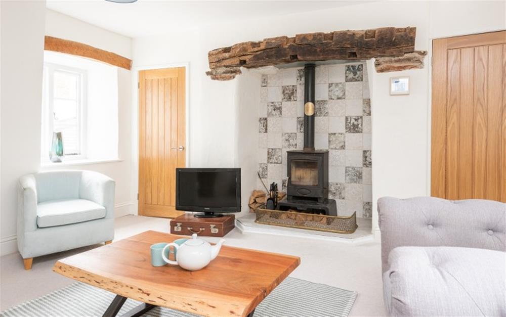 Get cosy by the wood burning stove at Jasmine Cottage, Chipton Barton in Dittisham