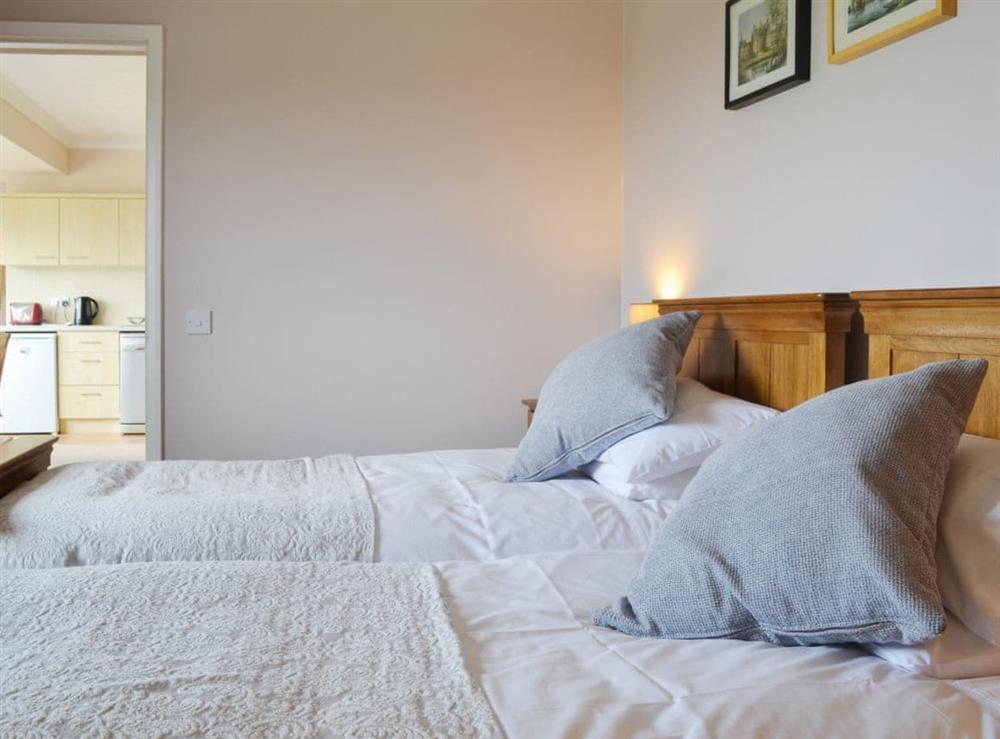 Comfortable twin bedroom at Jasmine Cottage in Consett, near Durham, County Durham, England