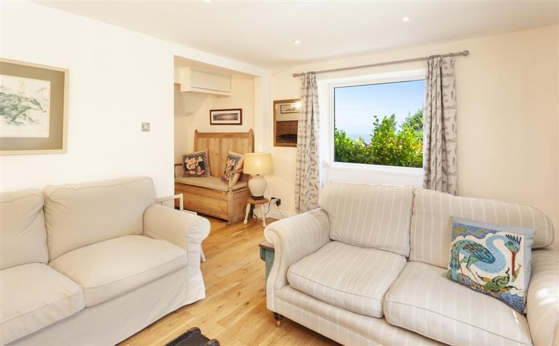 Relax in the living area at Jasmine Cottage, Porlock
