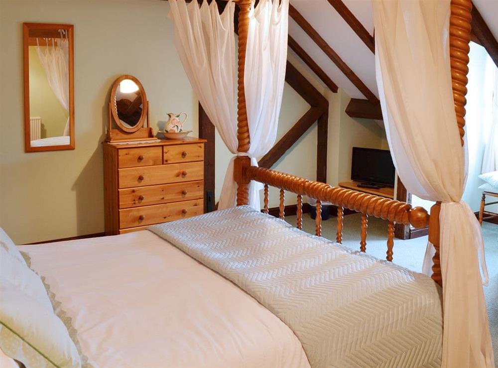 Four Poster bedroom at Jasmine Cottage in Scarborough, North Yorkshire