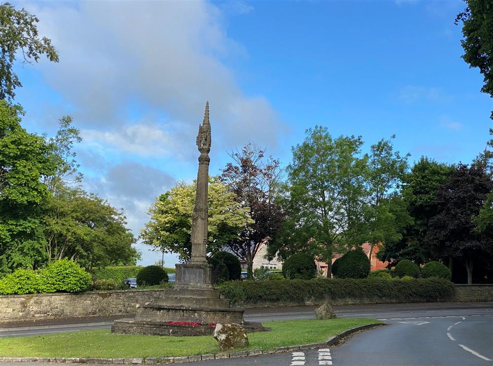 The memorial cross in Iwerne Minster next to Jasmine Cottage