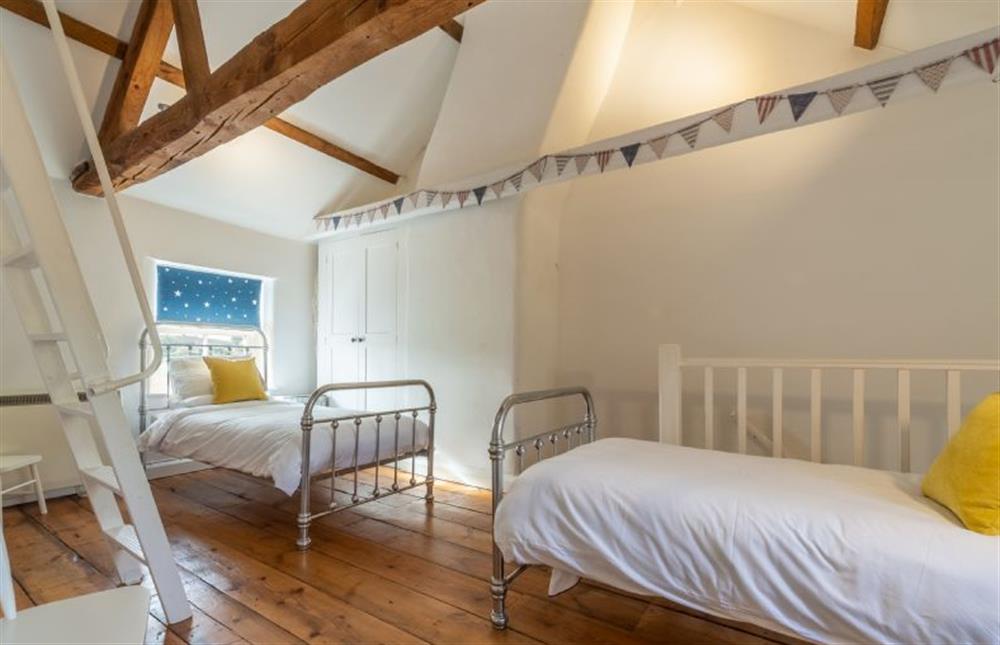 First floor: Bedroom two, twin bedroom, and ships ladder at Jasmine Cottage, South Creake near Fakenham