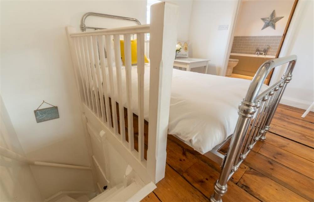 First floor: Bedroom two, twin bedroom and steep stairs to ground floor at Jasmine Cottage, South Creake near Fakenham