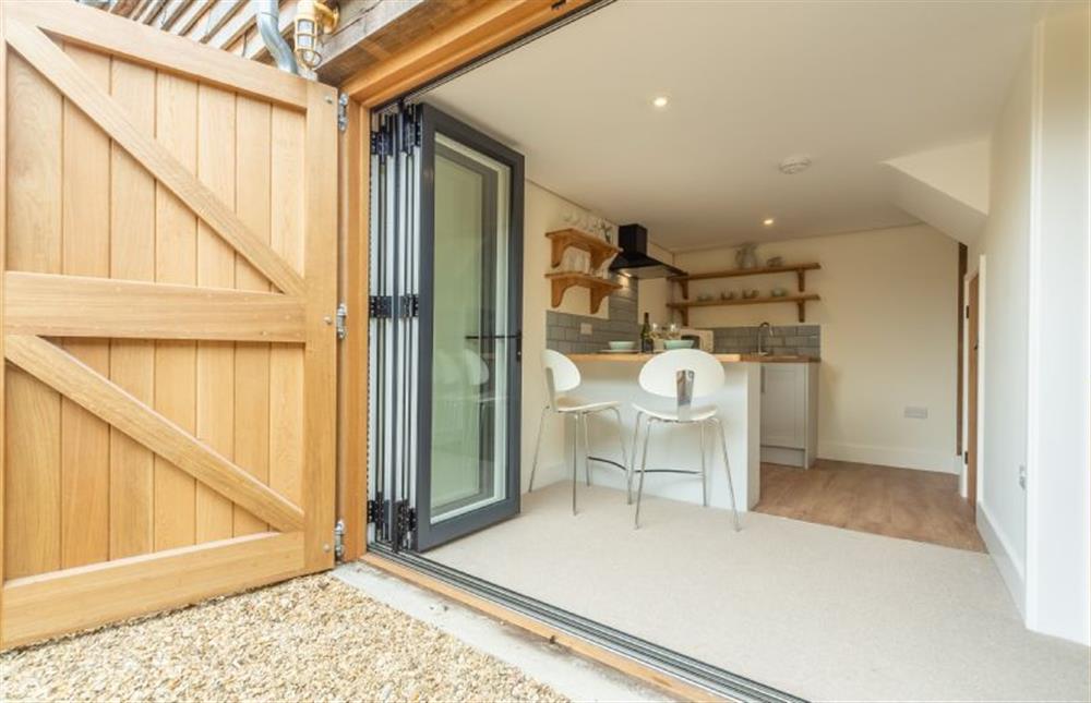 The Annexe: Bi-fold doors into the kitchen area at Jasmine Cottage, South Creake near Fakenham