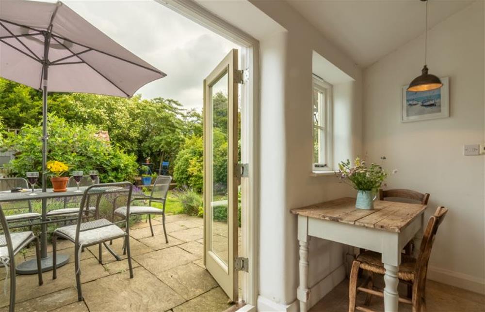 The kitchen opens out into the enclosed cottage garden at Jasmine Cottage, South Creake near Fakenham