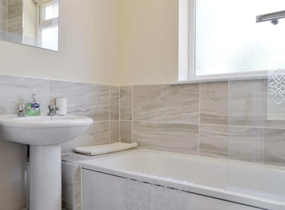 Bathroom with shower over bath at Jasper in Broadstone, near Bournemouth, Dorset