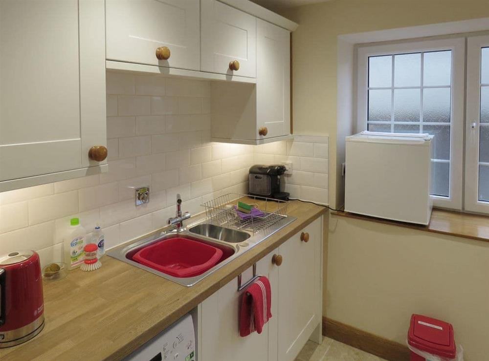 Well-equipped fitted kitchen at Dippers Folly, 
